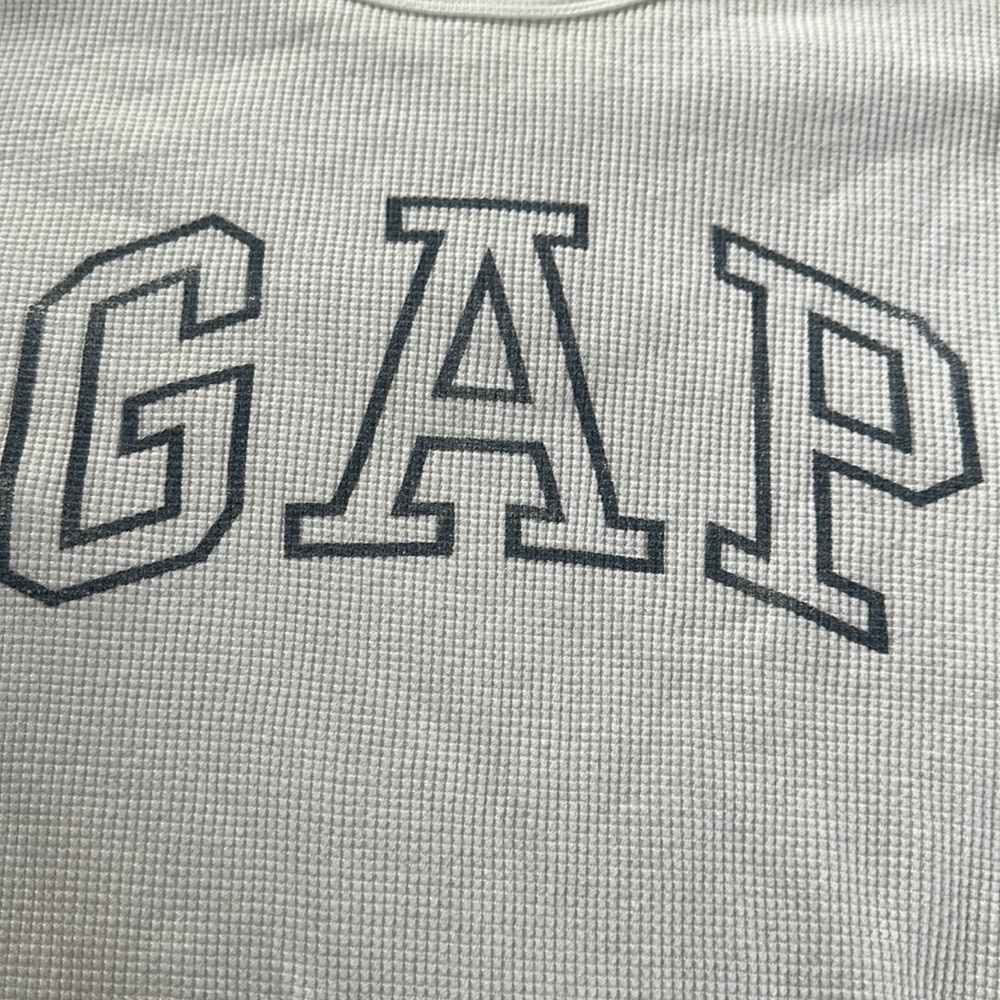Used white GAP crewneck, dark blue/gray outlined logo